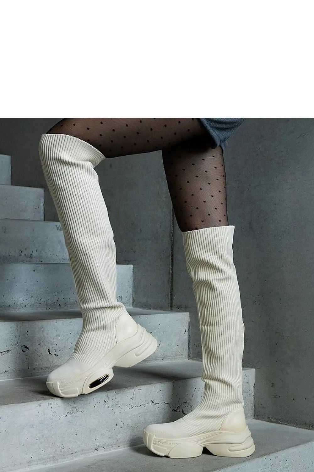 Beige slip-on boots with an elastic collar