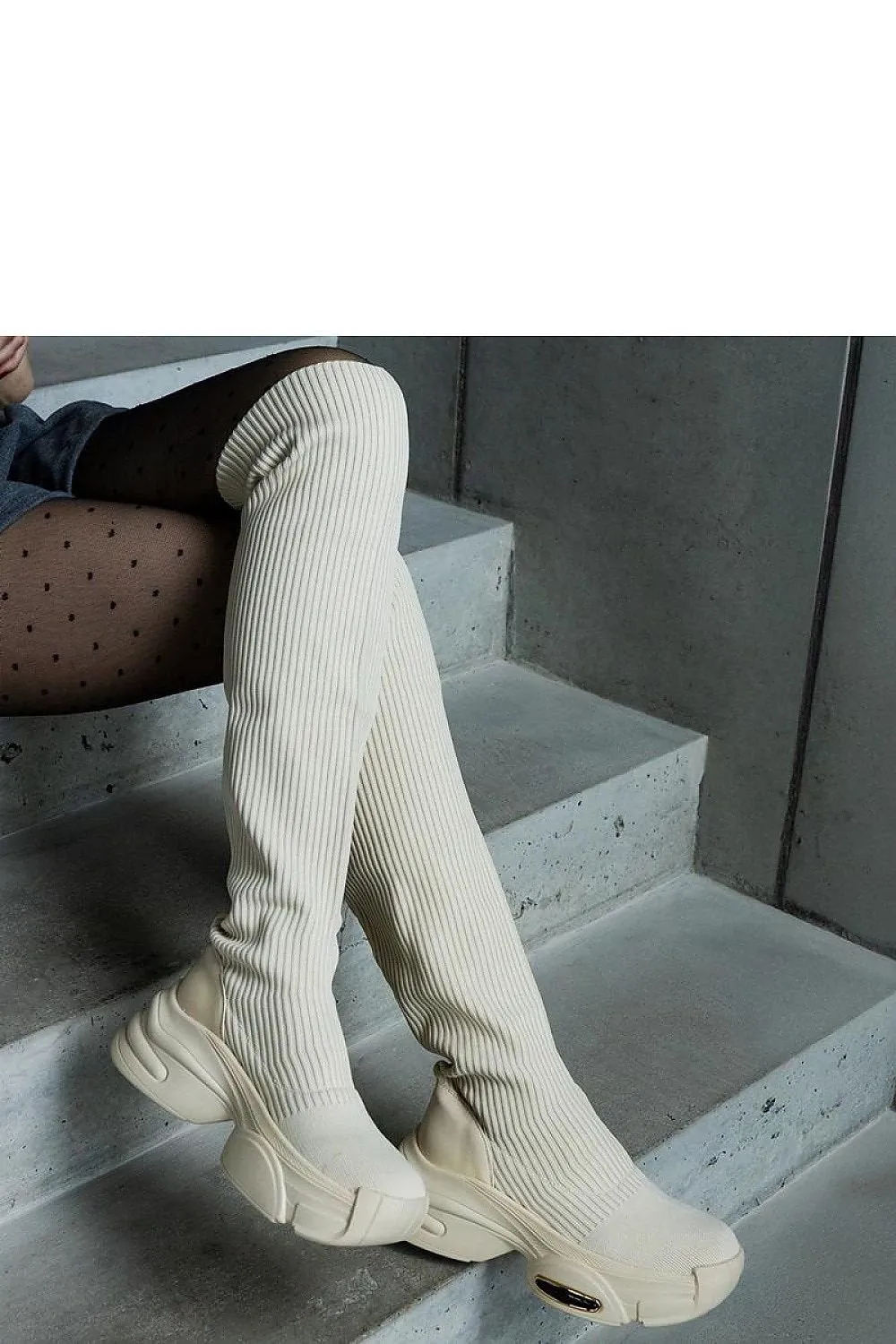 Beige slip-on boots with an elastic collar