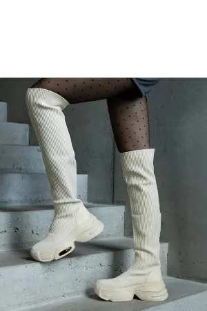 Beige slip-on boots with an elastic collar