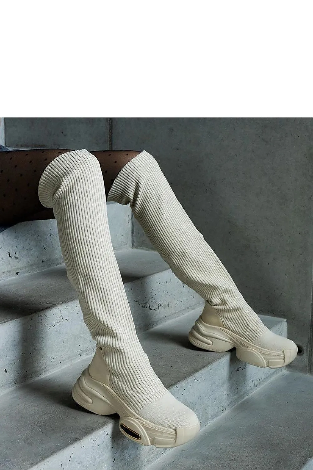 Beige slip-on boots with an elastic collar